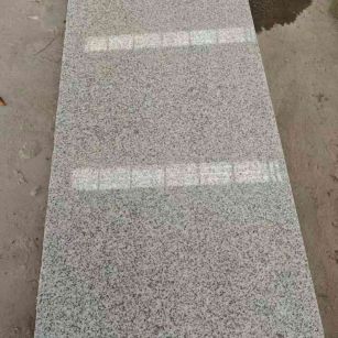 温州芝麻白光面毛板